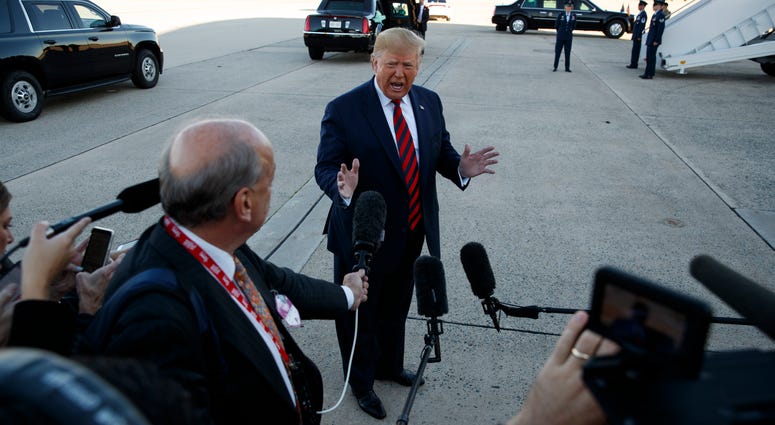 President Donald Trump talks to reporters before boarding Air Force One for a trip to Chicago to attend the International Association of Chiefs of Police Annual Conference and Exposition, Monday, Oct. 28, 2019, in Andrews Air Force Base, Md. President Donald Trump