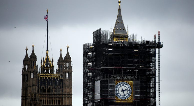 A view of the Victoria Tower, left, and the Elizabeth Tower, which holds the bell known as "Big Ben," in London, Friday, Nov. 1, 2019. A view of the Victoria Tower, left, and the Elizabeth Tower, which holds the bell known as "Big Ben," in London, Friday, Nov. 1, 2019.
