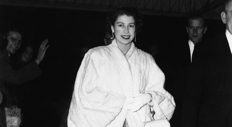 Britain's Queen Elizabeth II, wearing an ermine coat over her full-skirted evening dress, arrives at Royal Festival Hall in London to attend the St. Cecilia's Day concert on Nov. 28, 1952. Britain's Queen Elizabeth II, wearing an ermine coat over her full-skirted evening dress, arrives at Royal Festival Hall in London to attend the St. Cecilia's Day concert on Nov. 28, 1952.