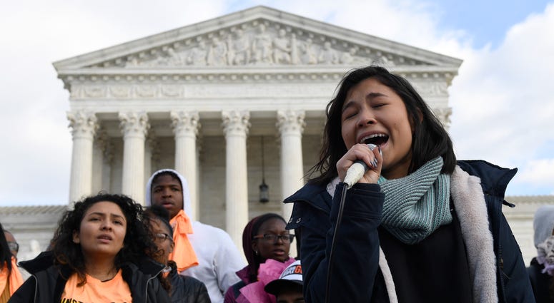 The Supreme Court on Tuesday takes up the Trump administration’s plan to end legal protections that shield nearly 700,000 immigrants from deportation. Michelle Lainez, 17, originally from El Salvador but now living in Gaithersburg, Md., speaks during a rally outside the Supreme Court in Washington, Friday, Nov. 8, 2019.