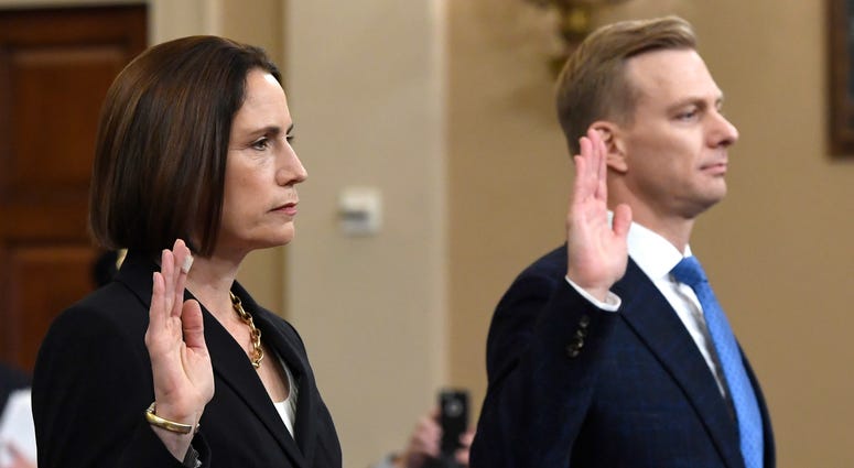 Former White House national security aide Fiona Hill, and David Holmes, a U.S. diplomat in Ukraine, are sworn in to testify before the House Intelligence Committee on Capitol Hill in Washington, Thursday, Nov. 21, 2019. Former White House national security aide Fiona Hill, and David Holmes, a U.S. diplomat in Ukraine, are sworn in to testify before the House Intelligence Committee on Capitol Hill in Washington, Thursday, Nov. 21, 2019.