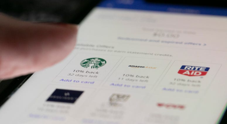 This Sunday, Dec. 1, 2019, photo shows rewards offered through Chase bank on an iPhone in the Brooklyn borough of New York. Chase bank rewards