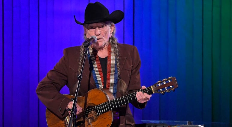 In this Nov. 13, 2019, file photo, Willie Nelson performs in Nashville, Tenn. Nelson may have given up smoking, but he hasn't stopped using marijuana. Willie Nelson