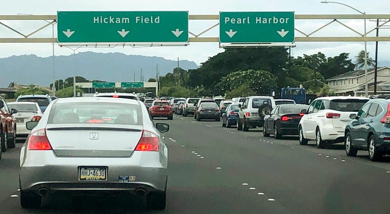 Traffic backs up at the main gates after a shooting at Pearl Harbor Naval shipyard, Wednesday, Dec. 4, 2019. Traffic backs up at the main gates after a shooting at Pearl Harbor Naval shipyard, Wednesday, Dec. 4, 2019.