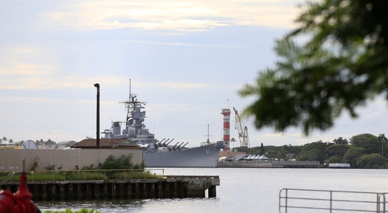A U.S. naval ship can been seen from Pearl Harbor National Memorial Wednesday, Dec. 4, 2019, in Honolulu. A U.S. naval ship can been seen from Pearl Harbor National Memorial Wednesday, Dec. 4, 2019, in Honolulu.