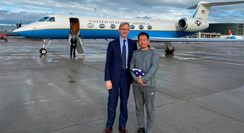 In a trade conducted in Zurich, Iranian officials handed over Chinese-American graduate student Xiyue Wang, detained in Tehran since 2016, for scientist Massoud Soleimani, who had faced a federal trial in Georgia. U.S. special representative for Iran, Brian Hook stands with Xiyue Wang in Zurich, Switzerland on Saturday, Dec. 7, 2019.