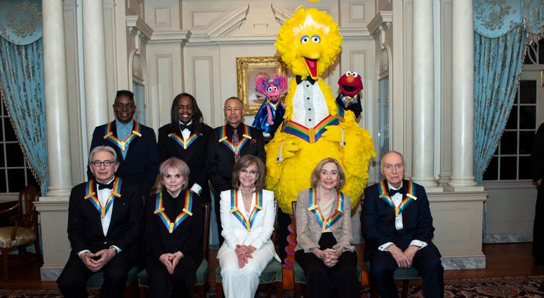 Front row from left, 2019 Kennedy Center Honorees Michael Tilson Thomas, Linda Ronstadt, Sally Field, Joan Ganz Cooney, and Lloyd Morrisett, back row from left, Philip Bailey, Verdine White, Ralph Johnson, and characters from "Sesame Street." Front row from left, 2019 Kennedy Center Honorees Michael Tilson Thomas, Linda Ronstadt, Sally Field, Joan Ganz Cooney, and Lloyd Morrisett, back row from left, Philip Bailey, Verdine White, Ralph Johnson, and characters from "Sesame Street."