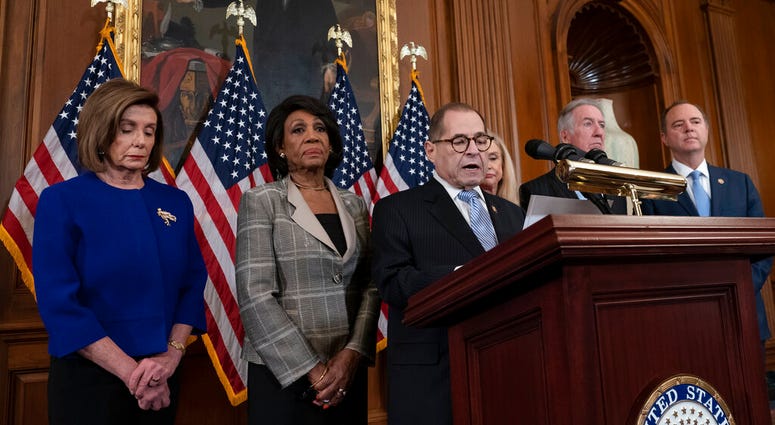 Democrats announce they are pushing ahead with two articles of impeachment against President Donald Trump. Democrats announce they are pushing ahead with two articles of impeachment against President Donald Trump.
