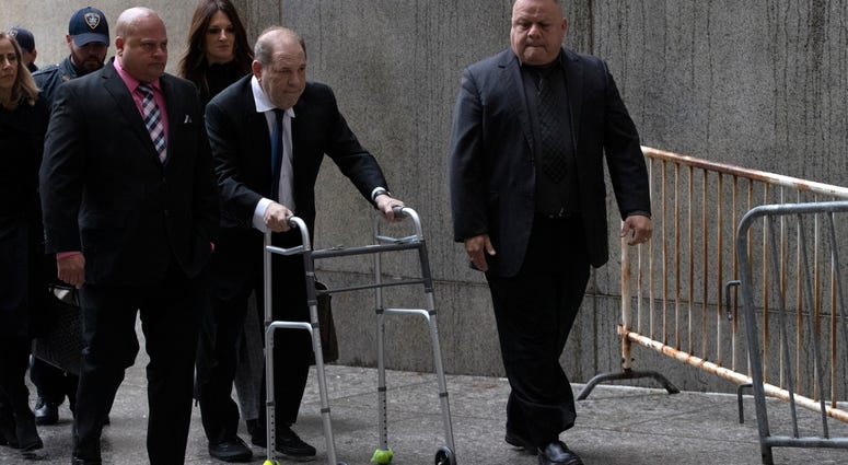 Harvey Weinstein, center, arrives for a court hearing, Wednesday, Dec. 11, 2019 in New York. Harvey Weinstein
