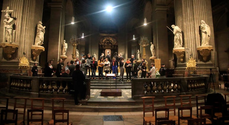 Members of the Notre Dame cathedral choir rehearse at the Saint Sulpice church in Paris. Members of the Notre Dame cathedral choir rehearse at the Saint Sulpice church in Paris.