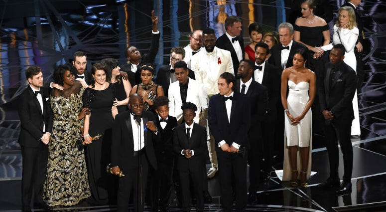 FILE - This Feb. 26, 2017 file photo shows Barry Jenkins and the cast and crew of "Moonlight" accepting the award for best picture at the Oscars in Los Angeles. FILE - This Feb. 26, 2017 file photo shows Barry Jenkins and the cast and crew of "Moonlight" accepting the award for best picture at the Oscars in Los Angeles.