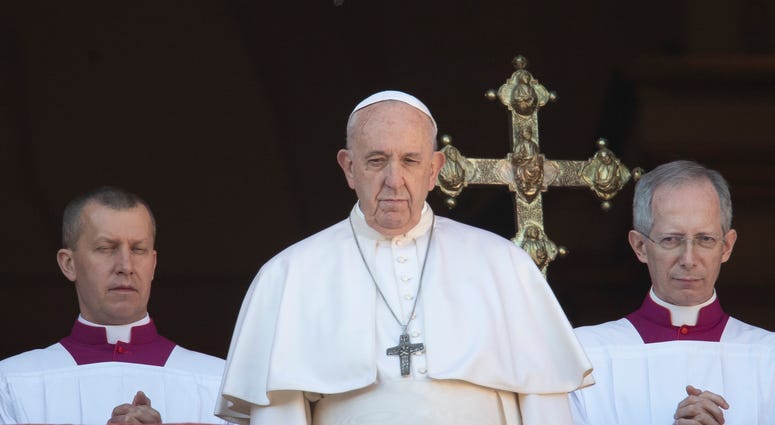 Pope Francis looks at the crowd after he delivered the Urbi et Orbi (Latin for 'to the city and to the world' ) Christmas' day blessing from the main balcony of St. Peter's Basilica at the Vatican, Wednesday, Dec. 25, 2019. Pope Francis looks at the crowd after he delivered the Urbi et Orbi (Latin for 'to the city and to the world' ) Christmas' day blessing from the main balcony of St. Peter's Basilica at the Vatican, Wednesday, Dec. 25, 2019.