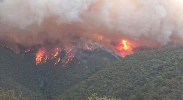 Massive plumes of smoke rise from wildfires burning in East Gippsland, Victoria. Massive plumes of smoke rise from wildfires burning in East Gippsland, Victoria.