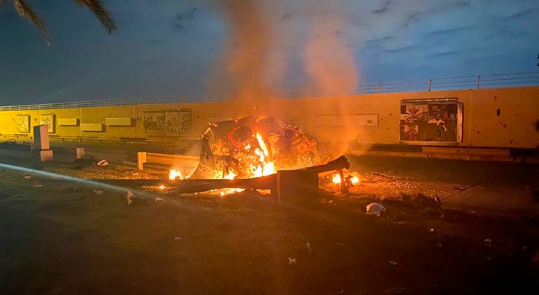 A burning vehicle is shown at Baghdad International Airport following an airstrike, in Baghdad, Iraq, early Friday, Jan. 3, 2020. A burning vehicle is shown at Baghdad International Airport following an airstrike, in Baghdad, Iraq, early Friday, Jan. 3, 2020.
