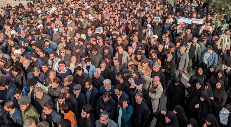 Protesters demonstrate over the U.S. airstrike in Iraq that killed Iranian Revolutionary Guard Gen. Qassem Soleimani in Tehran, Iran, Jan. 3, 2020. Protesters demonstrate over the U.S. airstrike in Iraq that killed Iranian Revolutionary Guard Gen. Qassem Soleimani in Tehran, Iran, Jan. 3, 2020.