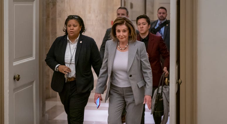 Speaker of the House Nancy Pelosi hasn't relayed the articles of impeachment to the Senate for trial three weeks since President Donald Trump was impeached on charges of abuse and obstruction. Speaker of the House Nancy Pelosi arrives at the Capitol in Washington, D.C. on Friday.