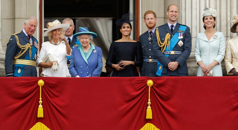 In this Tuesday, July 10, 2018 file photo, members of the royal family gather on the balcony of Buckingham Palace. In this Tuesday, July 10, 2018 file photo, members of the royal family gather on the balcony of Buckingham Palace.