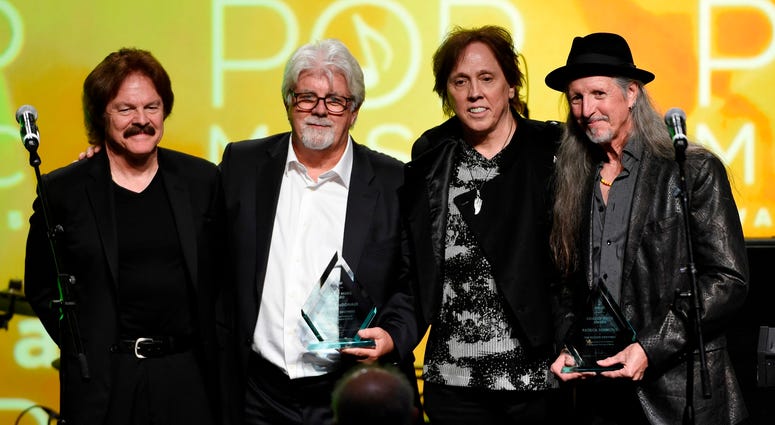 This April 29, 2015 file photo shows from left, Tom Johnston, Michael McDonald, John McFee and Pat Simmons of the Doobie Brothers after receiving the ASCAP Voice of Music Award at the 32nd Annual ASCAP Pop Music Awards in Los Angeles. This April 29, 2015 file photo shows from left, Tom Johnston, Michael McDonald, John McFee and Pat Simmons of the Doobie Brothers after receiving the ASCAP Voice of Music Award at the 32nd Annual ASCAP Pop Music Awards in Los Angeles.