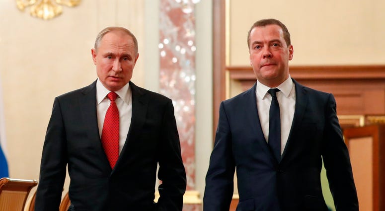 Russian President Vladimir Putin, left, and Russian Prime Minister Dmitry Medvedev walk prior to a cabinet meeting in Moscow, Russia, Wednesday, Jan. 15, 2020. Russian President Vladimir Putin, left, and Russian Prime Minister Dmitry Medvedev walk prior to a cabinet meeting in Moscow, Russia, Wednesday, Jan. 15, 2020.