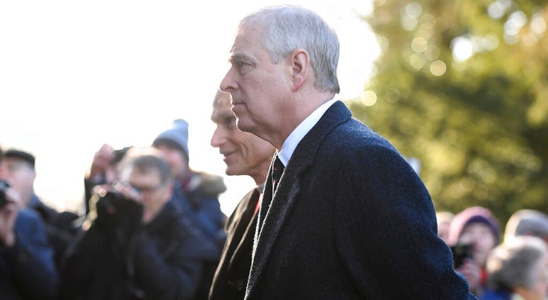 FILE - In this Jan. 19, 2020 file photo, Britain's Prince Andrew accompanies Queen Elizabeth II to attend a church service at St Mary the Virgin, in Hillington, England. Britain's Prince Andrew accompanies Queen Elizabeth II to attend a church service at St Mary the Virgin, in Hillington, England.
