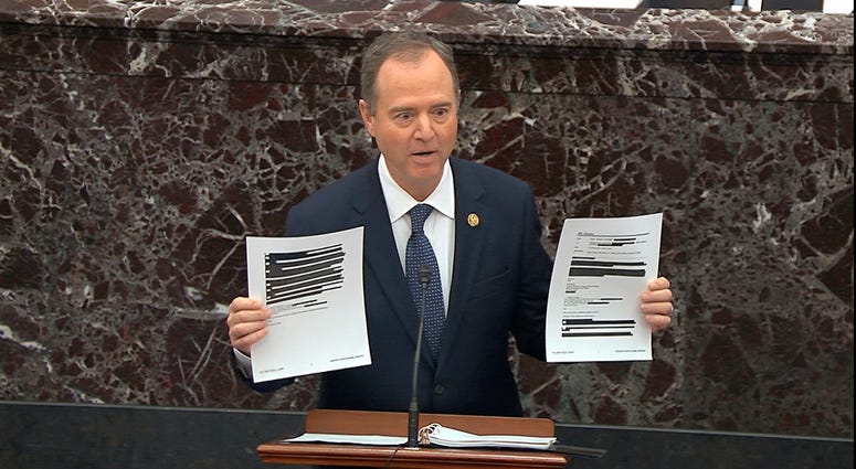 In this image from video, House impeachment manager Rep. Adam Schiff, D-Calif., holds redacted documents as he speaks during the impeachment trial against President Donald Trump in the Senate at the U.S. Capitol in Washington, Wednesday, Jan. 22, 2020. In this image from video, House impeachment manager Rep. Adam Schiff, D-Calif., holds redacted documents as he speaks during the impeachment trial against President Donald Trump in the Senate at the U.S. Capitol in Washington, Wednesday, Jan. 22, 2020.