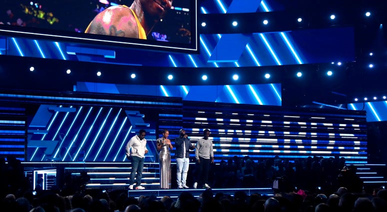 Alicia Keys, second left, and members of Boys II Men, from left, Nathan Morris, Wanya Morris and Shawn Stockman, sing "It's So Hard to Say Goodbye to Yesterday" during a tribute to the late Kobe Bryant, seen on screen, at the 62nd annual Grammy Awards. Alicia Keys, second left, and members of Boys II Men, from left, Nathan Morris, Wanya Morris and Shawn Stockman, sing "It's So Hard to Say Goodbye to Yesterday" during a tribute to the late Kobe Bryant, seen on screen, at the 62nd annual Grammy Awards.