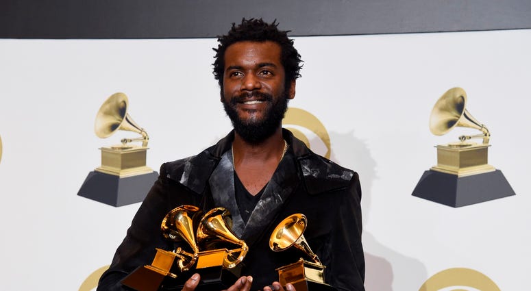 Gary Clark Jr. poses in the press room with the awards for best rock song, best rock performance and best contemporary blues album at the 62nd annual Grammy Awards at the Staples Center on Sunday, Jan. 26, 2020, in Los Angeles. Gary Clark Jr. poses in the press room with the awards for best rock song, best rock performance and best contemporary blues album at the 62nd annual Grammy Awards at the Staples Center on Sunday, Jan. 26, 2020, in Los Angeles.