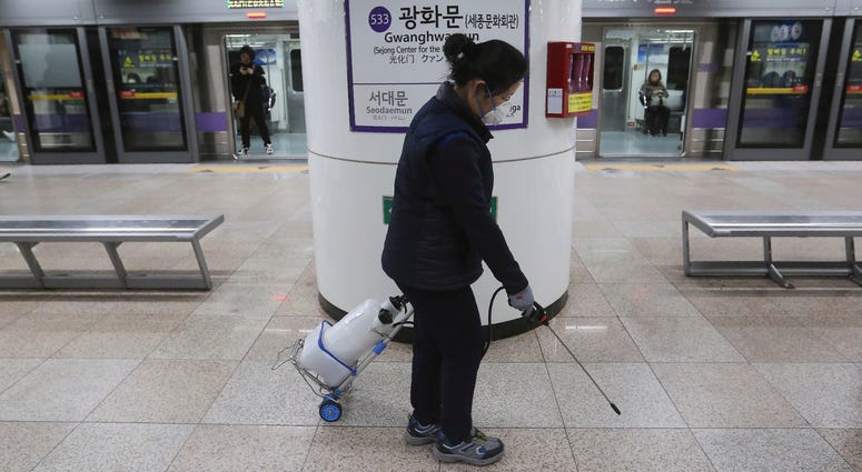 An employee disinfects the platform in hopes to prevent transmission of the coronavirus at a subway station in Seoul, South Korea, Tuesday, Jan. 28, 2020. An employee disinfects the platform in hopes to prevent transmission of the coronavirus at a subway station in Seoul, South Korea, Tuesday, Jan. 28, 2020.