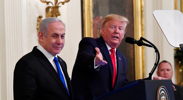 President Donald Trump, joined by Israeli Prime Minister Benjamin Netanyahu, speaks during an event in the East Room of the White House in Washington, Tuesday, Jan. 28, 2020. President Donald Trump, joined by Israeli Prime Minister Benjamin Netanyahu, speaks during an event in the East Room of the White House in Washington, Tuesday, Jan. 28, 2020.