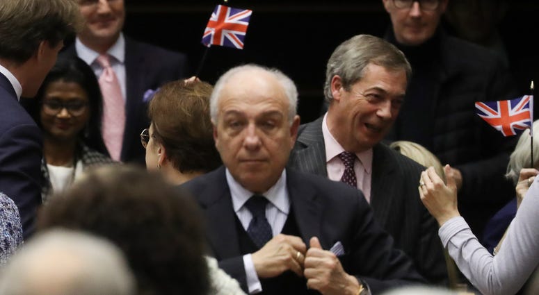 Brexit Party leader Nigel Farage, third right, reacts after the vote on the UK's withdrawal from the EU, the final legislative step in the Brexit proceedings, during the plenary session at the European Parliament in Brussels, Wednesday, Jan. 29, 2020. Brexit Party leader Nigel Farage, third right, reacts after the vote on the UK's withdrawal from the EU, the final legislative step in the Brexit proceedings, during the plenary session at the European Parliament in Brussels, Wednesday, Jan. 29, 2020.
