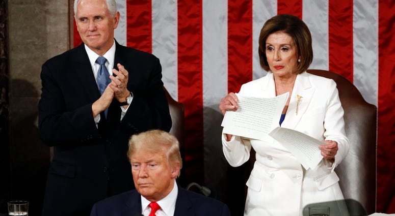House Speaker Nancy Pelosi of Calif., tears her copy of President Donald Trump's s State of the Union address after he delivered it to a joint session of Congress on Capitol Hill in Washington, Tuesday, Feb. 4, 2020. Vice President Mike Pence is at left. House Speaker Nancy Pelosi of Calif., tears her copy of President Donald Trump's s State of the Union address after he delivered it to a joint session of Congress on Capitol Hill in Washington, Tuesday, Feb. 4, 2020. Vice President Mike Pence is at left.