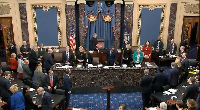 In this image from video, Chief Justice of the United States John Roberts arrives for the vote in the impeachment trial against President Donald Trump in the Senate at the U.S. Capitol in Washington, Wednesday, Feb. 5, 2020. Senate vote in the impeachment trial against President Donald Trump