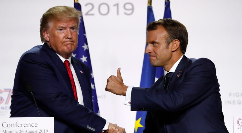 French President Emmanuel Macron and U.S President Donald Trump shake hands during the final press conference during the G7 summit in Biarritz, southwestern France, Aug. 26, 2019. French President Emmanuel Macron and U.S President Donald Trump shake hands during the final press conference during the G7 summit in Biarritz, southwestern France, Aug. 26, 2019.