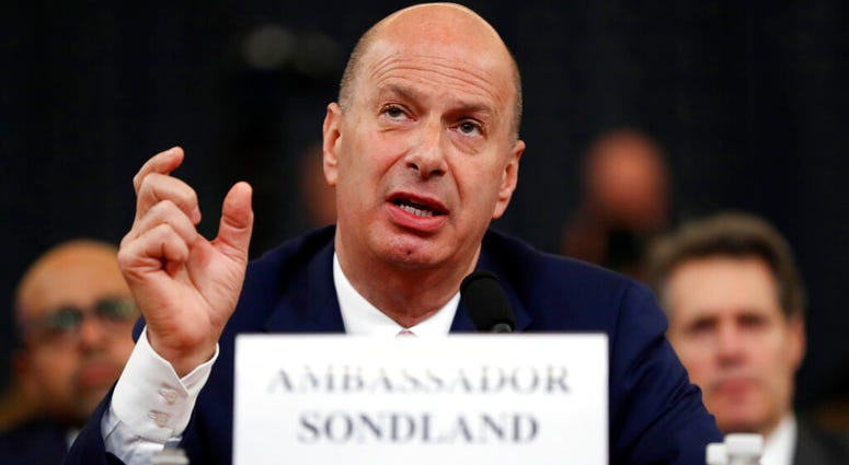 FILE - In this Wednesday, Nov. 20, 2019, file photo, U.S. Ambassador to the European Union Gordon Sondland testifies before the House Intelligence Committee on Capitol Hill in Washington. U.S. Ambassador to the European Union Gordon Sondland testifies before the House Intelligence Committee on Capitol Hill in Washington