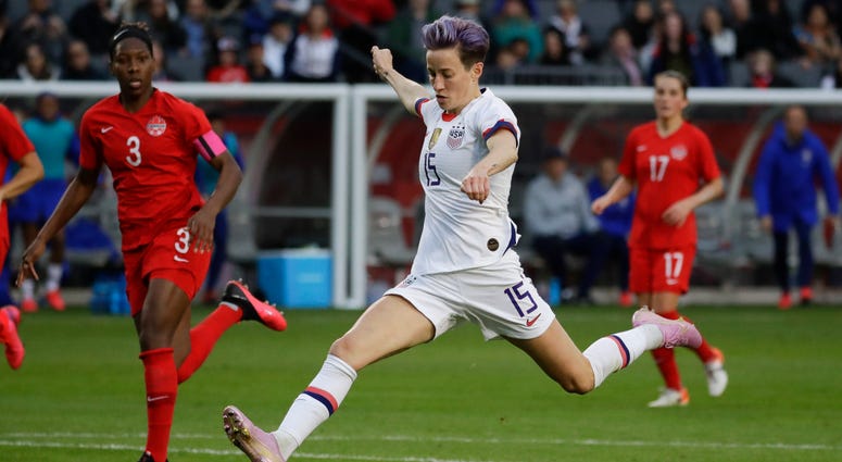 U.S. forward Megan Rapinoe scores against Canada during the second half of a CONCACAF women's Olympic qualifying soccer match Sunday, Feb. 9, 2020, in Carson, Calif. The U.S. won 3-0. U.S. forward Megan Rapinoe scores against Canada during the second half of a CONCACAF women's Olympic qualifying soccer match Sunday, Feb. 9, 2020, in Carson, Calif. The U.S. won 3-0.