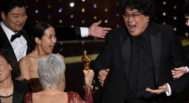 Bong Joon Ho, right, reacts as he is presented with the award for best picture for "Parasite" from presenter Jane Fonda at the Oscars on Sunday, Feb. 9, 2020, at the Dolby Theatre in Los Angeles. Bong Joon Ho, right, reacts as he is presented with the award for best picture for "Parasite" from presenter Jane Fonda at the Oscars on Sunday, Feb. 9, 2020, at the Dolby Theatre in Los Angeles.