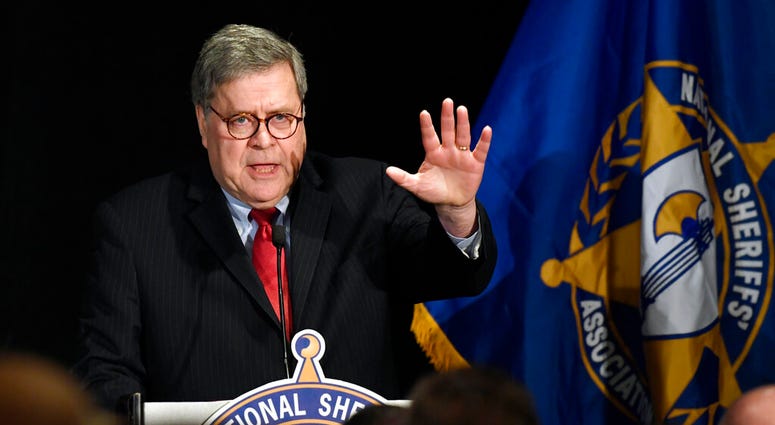 Attorney General William Barr waves as he walks on stage to speak at the National Sheriffs' Association Winter Legislative and Technology Conference in Washington, Monday, Feb. 10, 2020. Attorney General William Barr waves as he walks on stage to speak at the National Sheriffs' Association Winter Legislative and Technology Conference in Washington.