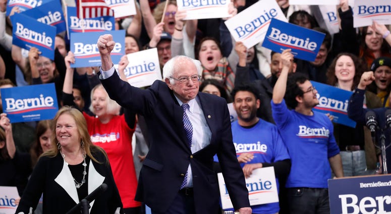 Democratic presidential candidate Sen. Bernie Sanders, I-Vt., with his wife Jane O'Meara Sanders, arrives to speak to supporters at a primary night election rally in Manchester, N.H., Tuesday, Feb. 11, 2020. Democratic presidential candidate Sen. Bernie Sanders, I-Vt., with his wife Jane O'Meara Sanders, arrives to speak to supporters at a primary night election rally in Manchester, N.H., Tuesday, Feb. 11, 2020.