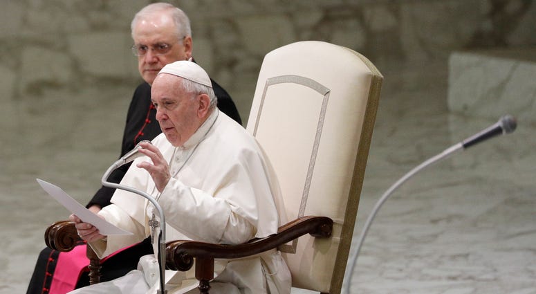 Pope Francis reads his message during the weekly general audience at the Vatican, Wednesday, Feb. 12, 2020. Pope Francis