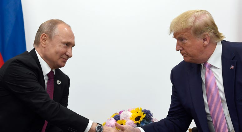President Donald Trump, right, shakes hands with Russian President Vladimir Putin, left, during a bilateral meeting on the sidelines of the G-20 summit in Osaka, Japan, on June 28, 2019. President Donald Trump, right, shakes hands with Russian President Vladimir Putin, left, during a bilateral meeting on the sidelines of the G-20 summit in Osaka, Japan, on June 28, 2019.