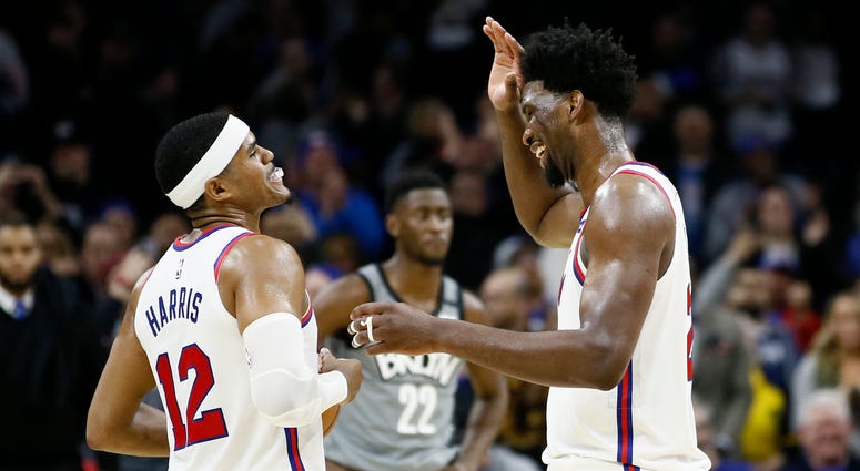 Philadelphia 76ers' Tobias Harris, left, and Joel Embiid celebrate during overtime in an NBA basketball game against the Brooklyn Nets, Thursday, Feb. 20, 2020, in Philadelphia. Philadelphia won 112-104. Philadelphia 76ers' Tobias Harris, left, and Joel Embiid celebrate during overtime in an NBA basketball game against the Brooklyn Nets, Thursday, Feb. 20, 2020, in Philadelphia. Philadelphia won 112-104.