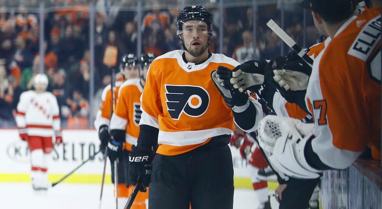 Philadelphia Flyers' Ivan Provorov celebrates with teammates after scoring a goal during the first period of an NHL hockey game against the Carolina Hurricanes, Thursday, March 5, 2020, in Philadelphia. Philadelphia Flyers' Ivan Provorov celebrates with teammates after scoring a goal during the first period of an NHL hockey game against the Carolina Hurricanes, Thursday, March 5, 2020, in Philadelphia.