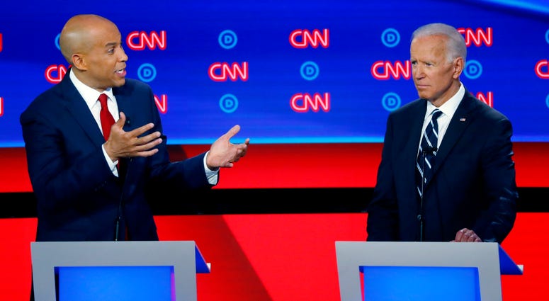 Sen. Cory Booker, D-N.J., gestures to former Vice President Joe Biden during the second of two Democratic presidential primary debates hosted by CNN in the Fox Theatre in Detroit, July 31, 2019. Sen. Cory Booker, D-N.J., gestures to former Vice President Joe Biden during the second of two Democratic presidential primary debates hosted by CNN in the Fox Theatre in Detroit, July 31, 2019.