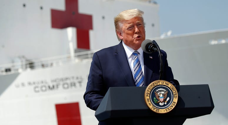 President Donald Trump speaks in front of the U.S. Navy hospital ship USNS Comfort at Naval Station Norfolk in Norfolk, Va., Saturday, March 28, 2020. President Donald Trump speaks in front of the U.S. Navy hospital ship USNS Comfort at Naval Station Norfolk in Norfolk, Va., Saturday, March 28, 2020.