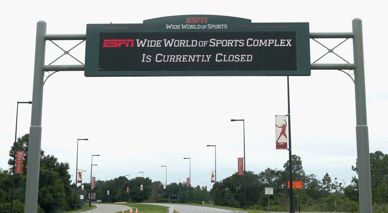 A sign at the entrance to ESPN's Wide World of Sports at Walt Disney World is seen Wednesday, June 3, 2020, in Kissimmee, Fla. A sign at the entrance to ESPN's Wide World of Sports at Walt Disney World is seen Wednesday, June 3, 2020, in Kissimmee, Fla.