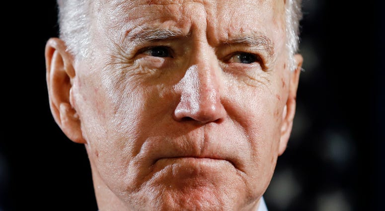 In this March 12, 2020, file photo Democratic presidential candidate former Vice President Joe Biden speaks about the coronavirus in Wilmington, Del. Biden has won the last few delegates he needed to clinch the Democratic nomination for president. In this March 12, 2020, file photo Democratic presidential candidate former Vice President Joe Biden speaks about the coronavirus in Wilmington, Del. Biden has won the last few delegates he needed to clinch the Democratic nomination for president.