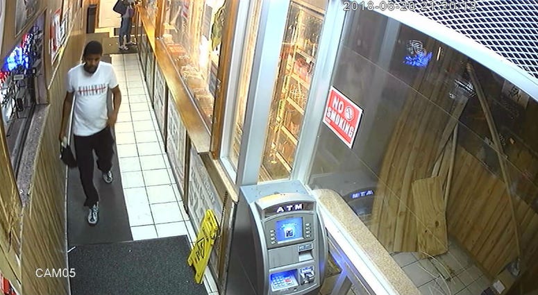 This image, taken from surveillance video, shows one of at least two men Philadelphia police are looking for in connection to an ATM explosion in Kensington Wednesday night. This image, taken from surveillance video, shows one of at least two men Philadelphia police are looking for in connection to an ATM explosion in Kensington Wednesday night.