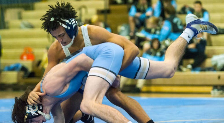 Buena high school wrestler Andrew Johnson wrestles Lower Cape May's Bobby O'Brien at 126 lb. at Buena Regional High School on Wednesday, January 17. Buena high school wrestler Andrew Johnson wrestles Lower Cape May's Bobby O'Brien at 126 lb. at Buena Regional High School on Wednesday, January 17.