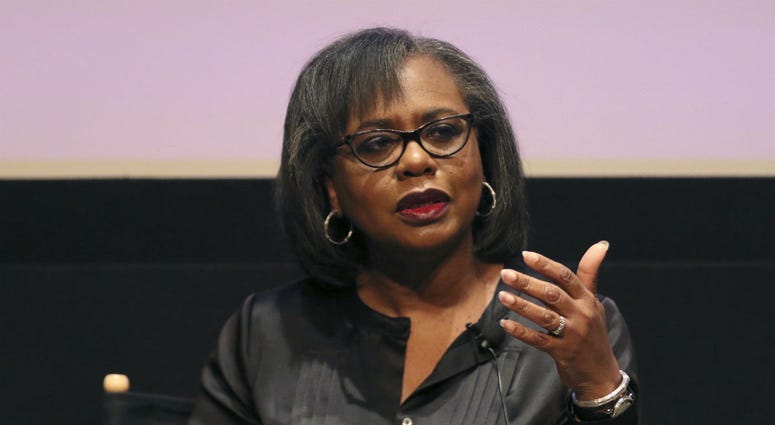 In this Dec. 8, 2017, file photo, Anita Hill speaks at a discussion about sexual harassment in Beverly Hills, Calif. In this Dec. 8, 2017, file photo, Anita Hill speaks at a discussion about sexual harassment in Beverly Hills, Calif.