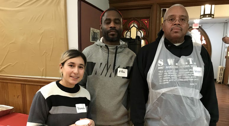 Volunteers serve Christmas breakfast at Arch Street United Methodist Church. Volunteers serve Christmas breakfast at Arch Street United Methodist Church.